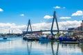 Fisherman port at the fish market with the beautiful view of Anzac bridge in the cloudy day.